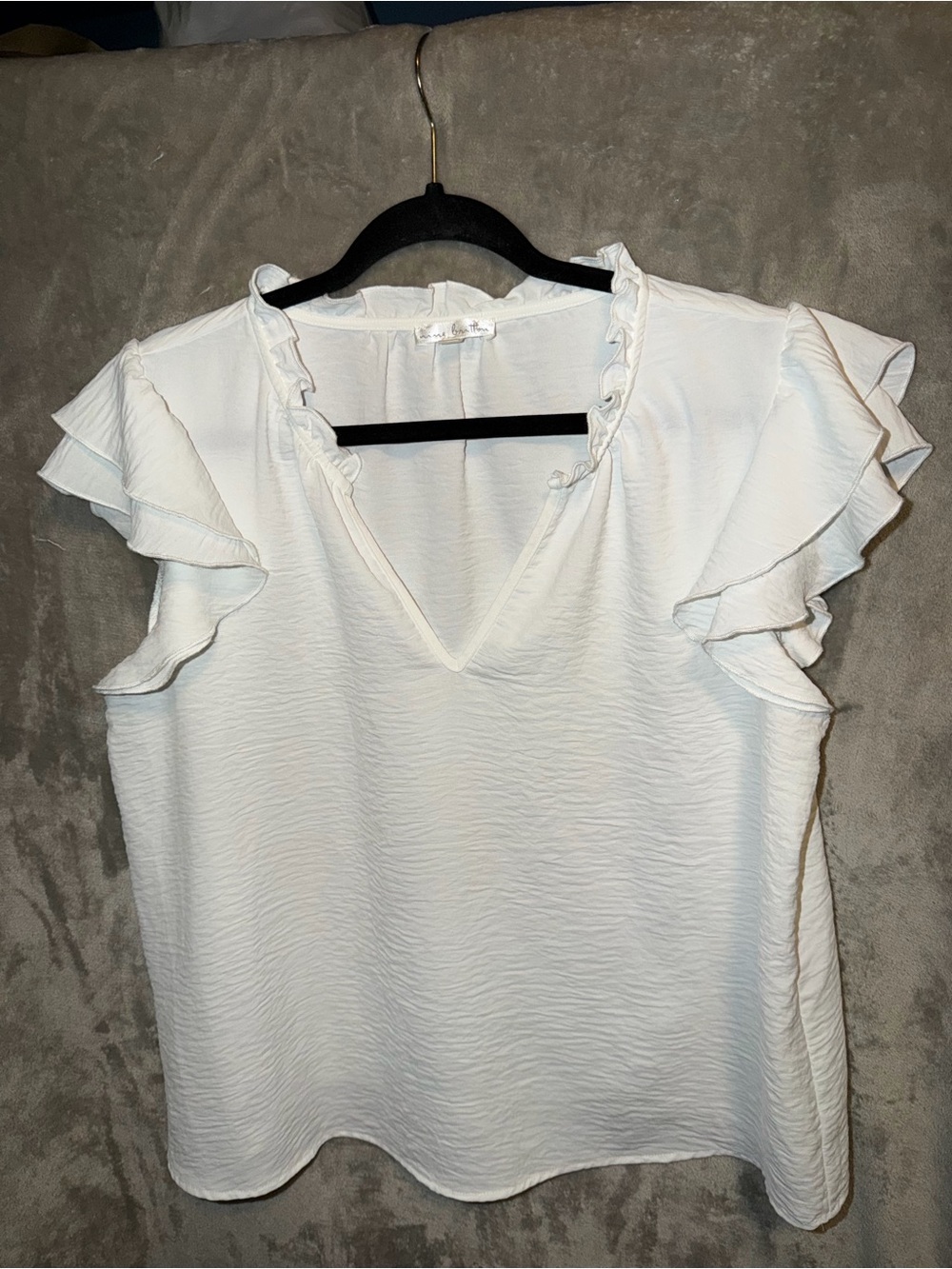 nine britton White Ruffle Sleeve V-Neck Blouse